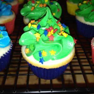 close up photo of a green cocos confections cupcake